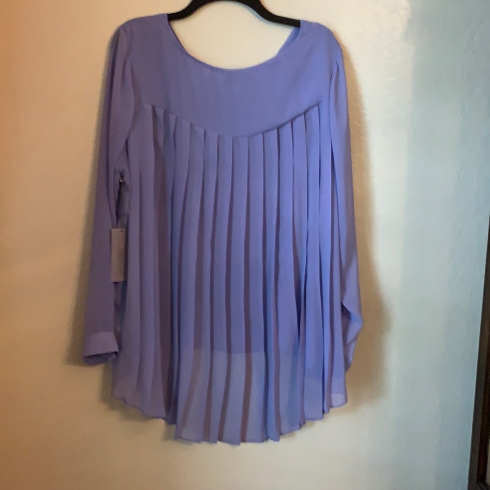 Jennifer Lopez bleated back light purple  top